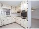 Traditional kitchen with white cabinets and stainless steel oven at 6582 Malvin Dr, Mableton, GA 30168