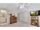 Spacious bedroom with an ensuite bathroom, and an adjacent closet, offering functionality and style at 6690 Cold Stream Dr, Cumming, GA 30040