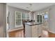 The kitchen features a granite-topped island and sliding glass doors to the patio at 6690 Cold Stream Dr, Cumming, GA 30040