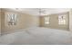 Spacious bedroom with three windows allowing natural light at 7690 Classic Way, Atlanta, GA 30350