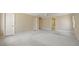 Spacious bedroom with white ceiling fan and access to ensuite bath and closet at 7690 Classic Way, Atlanta, GA 30350