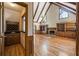 Cozy living room featuring a wet bar, fireplace, built-in shelves and vaulted ceilings at 7690 Classic Way, Atlanta, GA 30350