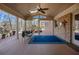 Inviting covered porch with brick accents and plenty of seating at 7690 Classic Way, Atlanta, GA 30350