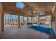 Spacious covered porch with skylights and view of wooded backyard at 7690 Classic Way, Atlanta, GA 30350