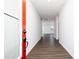 Inviting entryway with modern flooring and a brightly colored front door at 708 Ocmulgee Xing, Locust Grove, GA 30248