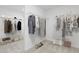 Spacious walk-in closet featuring ample storage with shelving and hanging rods at 708 Ocmulgee Xing, Locust Grove, GA 30248