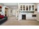 Basement bar area with custom cabinetry, beverage center, and stylish backsplash at 14 Long Island Pl., Atlanta, GA 30328