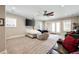 Large finished basement includes a media area with comfortable seating and lots of light at 14 Long Island Pl., Atlanta, GA 30328