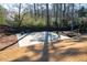 Backyard basketball court with a hoop and space for sports and recreation at 14 Long Island Pl., Atlanta, GA 30328