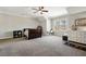 Spacious bedroom features neutral walls, a ceiling fan, a large window and carpet floors at 14 Long Island Pl., Atlanta, GA 30328
