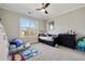 A bedroom featuring a large window, a bed and dresser and carpet floors at 14 Long Island Pl., Atlanta, GA 30328