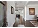 Elegant foyer with hardwood floors and stylish decor, creating a warm and inviting entrance to the home at 14 Long Island Pl., Atlanta, GA 30328