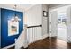 Bright hallway with chandelier leading to a bedroom at 14 Long Island Pl., Atlanta, GA 30328