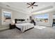 Bright and spacious main bedroom with large windows and cozy decor at 14 Long Island Pl., Atlanta, GA 30328