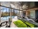 Inviting covered patio with comfortable lounge chairs and a view of the beautiful pool at 14 Long Island Pl., Atlanta, GA 30328