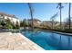 Large in-ground pool with a stone patio and ample room for outdoor seating at 14 Long Island Pl., Atlanta, GA 30328