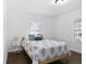 This cozy bedroom boasts natural light, hardwood floors, and comfortable decor at 444 W Lake Nw Ave, Atlanta, GA 30318