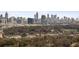 Scenic skyline of a bustling city, with visible buildings and green space in the foreground at 2044 Cottage Nw Ln, Atlanta, GA 30318