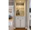 Charming wet bar area with wine storage and view to open living room at 2044 Cottage Nw Ln, Atlanta, GA 30318