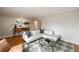 Comfortable living room with a stylish rug, modern sofa, and elegant decor, perfect for relaxation at 2044 Cottage Nw Ln, Atlanta, GA 30318