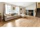 Bright living room with vaulted ceilings, a modern fireplace, and a staircase, perfect for entertaining at 4397 Shady Drive Nw, Lilburn, GA 30047