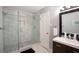Beautiful bathroom featuring a spacious walk-in shower with glass enclosure and a modern vanity at 2948 Legion Lake Rd, Douglasville, GA 30135