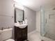 Clean bathroom featuring a glass shower, tile flooring, and a modern vanity at 2948 Legion Lake Rd, Douglasville, GA 30135