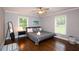 Bedroom with hardwood floors, natural light, and a minimalist design at 2948 Legion Lake Rd, Douglasville, GA 30135