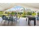 Spacious deck area with seating, a table, and a game table, perfect for outdoor entertaining at 2948 Legion Lake Rd, Douglasville, GA 30135
