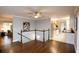 Entryway featuring hardwood floors and an open view of the kitchen and living areas at 2948 Legion Lake Rd, Douglasville, GA 30135