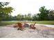 Outdoor firepit with seating, perfect for gatherings by the lake at 2948 Legion Lake Rd, Douglasville, GA 30135