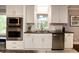 Well-equipped kitchen features stainless steel appliances, granite countertops, and ample cabinet space at 2948 Legion Lake Rd, Douglasville, GA 30135