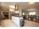 Open kitchen with a modern island, stainless steel appliances, and seamless flow into the dining area at 2948 Legion Lake Rd, Douglasville, GA 30135