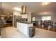 Open concept kitchen featuring stainless appliances, a kitchen island, and access to dining and living areas at 2948 Legion Lake Rd, Douglasville, GA 30135