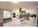 Bright, modern kitchen with stainless steel appliances, center island, and bar stool seating at 2948 Legion Lake Rd, Douglasville, GA 30135