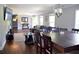 Open-concept living and dining area featuring hardwood floors, comfortable seating, and natural light at 2948 Legion Lake Rd, Douglasville, GA 30135
