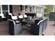 Outdoor dining area featuring a large dining table with chairs and grill, perfect for entertaining at 2948 Legion Lake Rd, Douglasville, GA 30135