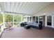 Comfortable outdoor living space on a covered deck with ample seating at 2948 Legion Lake Rd, Douglasville, GA 30135