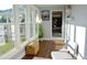 Bright and airy sunroom with large windows, perfect for enjoying natural light and relaxation at 2948 Legion Lake Rd, Douglasville, GA 30135