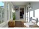Sun-filled room featuring ample windows, natural light, and a calming view of the outdoors at 2948 Legion Lake Rd, Douglasville, GA 30135