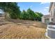 Large yard is perfect for relaxing. It has mature trees, lush greenery, and plenty of shade at 1183 Lanier Springs Dr, Buford, GA 30518