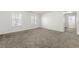 An airy bedroom featuring soft carpeting and bright windows, offering a serene and comfortable atmosphere at 1183 Lanier Springs Dr, Buford, GA 30518