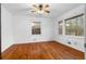 Comfortable bedroom featuring hardwood floors and lots of natural light at 1893 Kenwood Se Rd, Smyrna, GA 30082