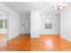 Bright living room with hardwood floors, large window and a welcoming front door at 1893 Kenwood Se Rd, Smyrna, GA 30082