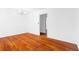 Inviting living room featuring gleaming hardwood floors and neutral paint at 1893 Kenwood Se Rd, Smyrna, GA 30082
