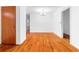 Light-filled living room boasts classic hardwood floors and neutral walls at 1893 Kenwood Se Rd, Smyrna, GA 30082