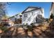 Backyard features a patio, hanging swing chairs and steps up to a deck at 1055 Amarose Ne Ln, Marietta, GA 30066