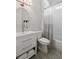 Bright bathroom features a tub, shower, and a modern vanity with a sink at 1055 Amarose Ne Ln, Marietta, GA 30066
