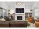 Bright living room featuring a fireplace, built-in bookshelves, comfortable seating, and neutral decor at 1055 Amarose Ne Ln, Marietta, GA 30066