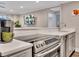 Kitchen with modern appliances, countertop seating and ample counter space at 300 Peachtree Ne St # 6H, Atlanta, GA 30308